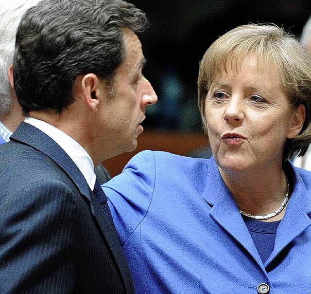 Und sie mag ihn doch: Sarkozy und Merkel   | Foto: afp