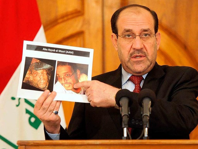 Iraks Ministerprsident Nuri el Maliki zeigt Bilder der Getteten  | Foto: dpa