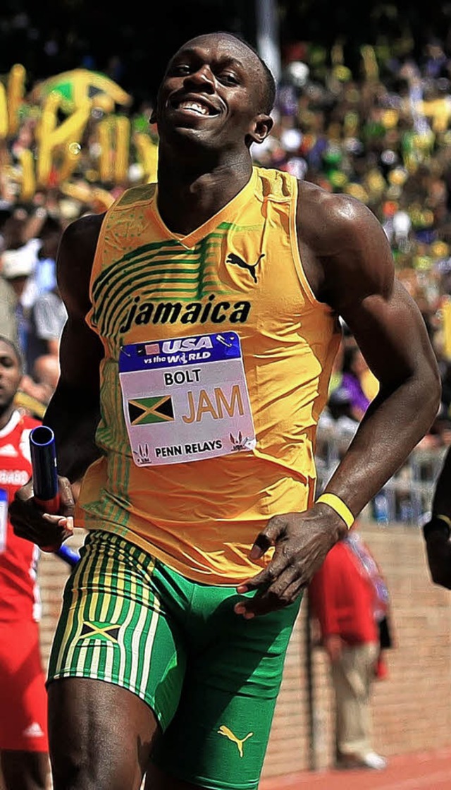Luft lchelnd ins Ziel: Usain Bolt   | Foto: afp