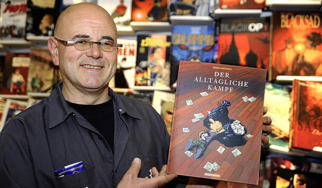 Der Comic-Buchhndler mit einem seiner Lieblingstitel: Ulrich Prfrock    | Foto: Thomas Kunz