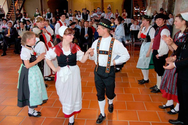 Junge Trachtentrger in der Mllheimer Martinskirche.   | Foto: Umiger