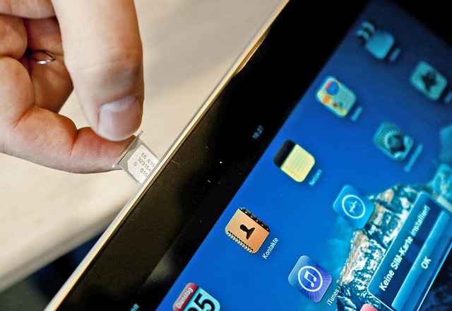 Neue Technik beim iPad: Die Micro-SIM-Karte  | Foto: dpa