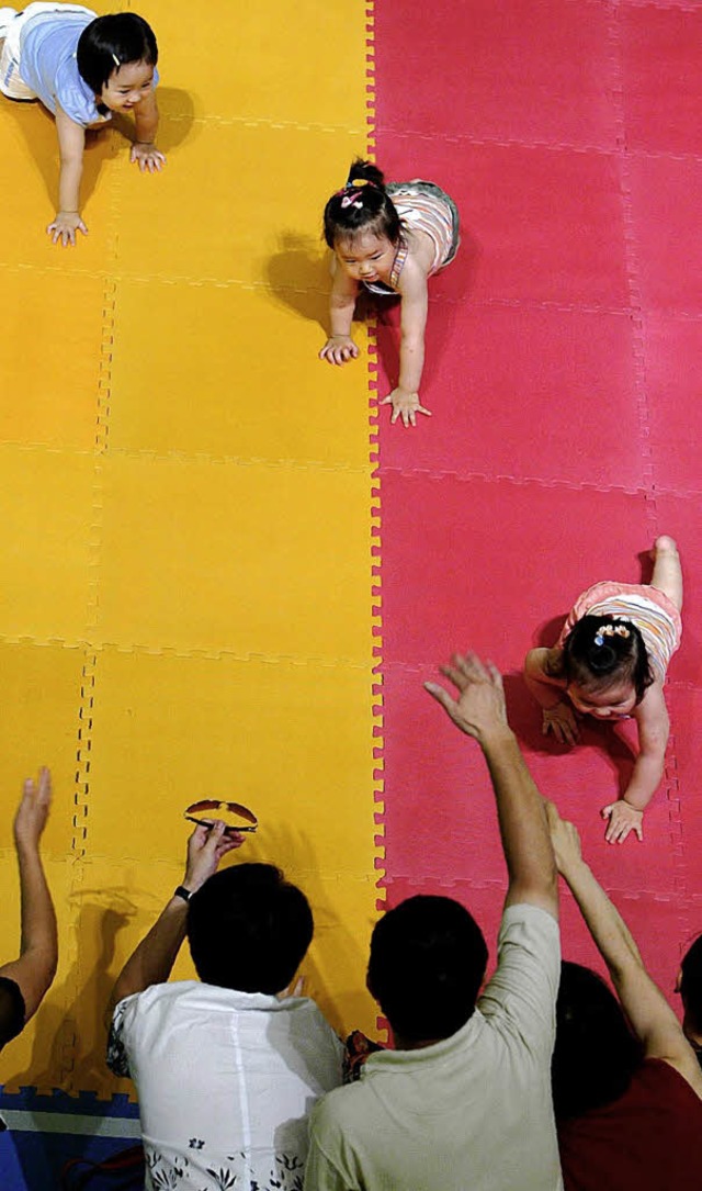 Unsinniger Wettlauf: Jedes Kind hat sein eigenes Tempo.   | Foto: AFP/BZ