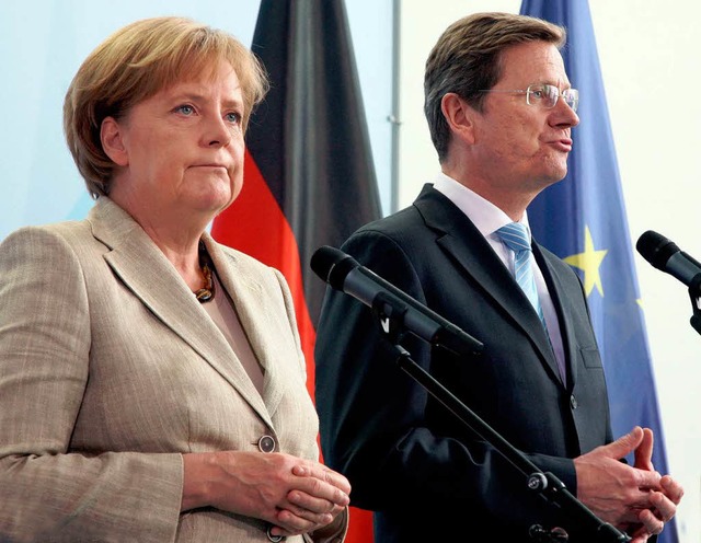 Bundeskanzlerin Angela Merkel (CDU) un...chweres Sparpaket auf den Weg bringen.  | Foto: dpa