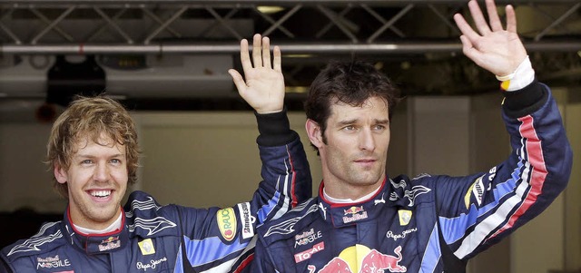 Wenn&#8217;s denn sein muss, prsentie...astian Vettel (links) und Mark Webber   | Foto: dpa
