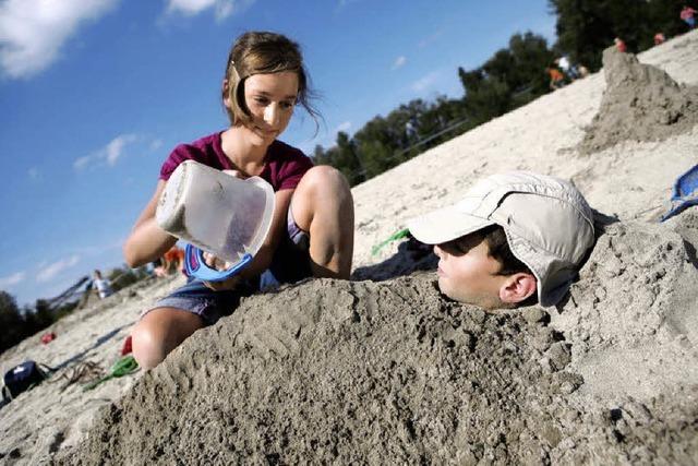 Kunst am Mensch mit Sand vom Strand