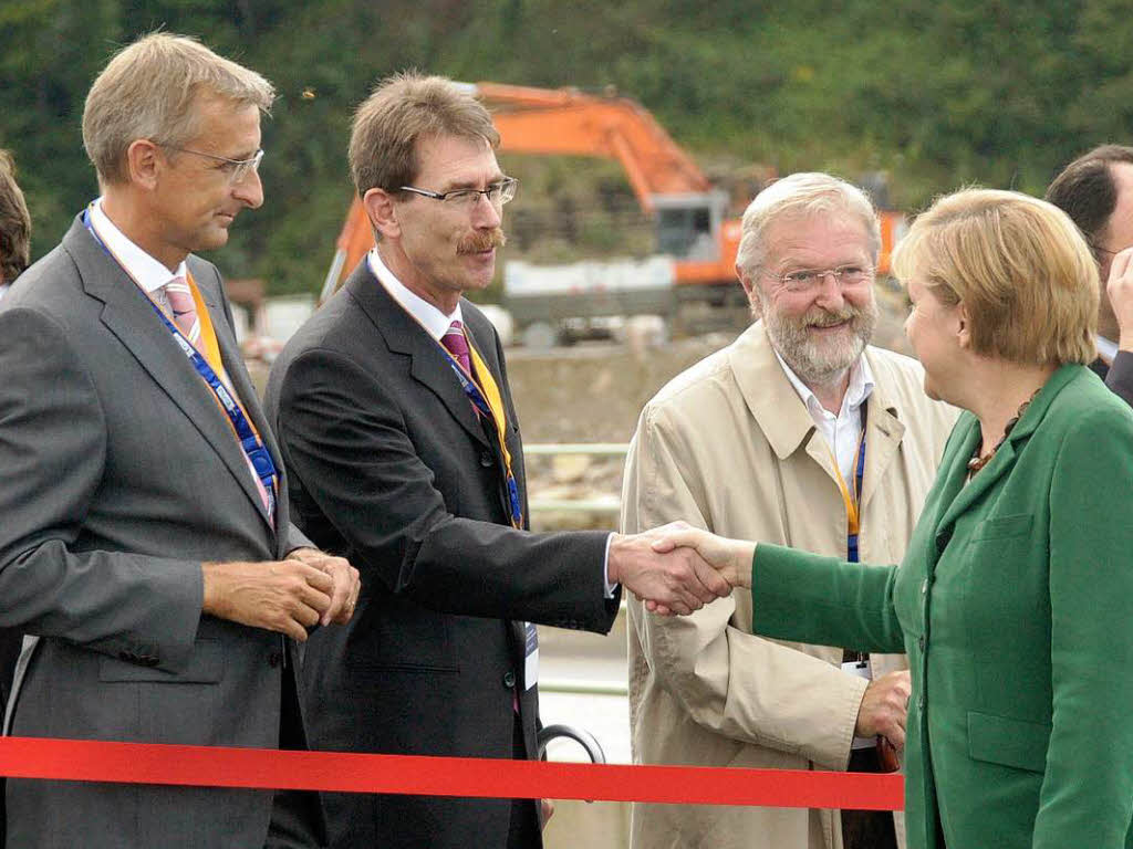 Hndedruck von der Kanzlerin: Evonik-Werkleiter Rainer Vierbaum