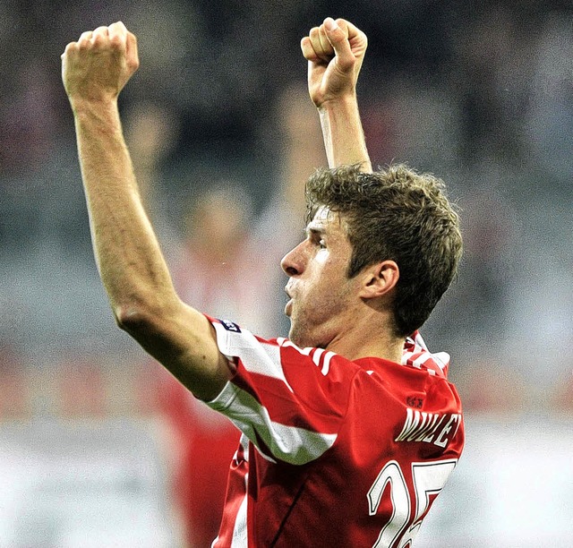 Thomas Mller bejubelt seinen Treffer zum 1:0 fr die Bayern.   | Foto: dpa