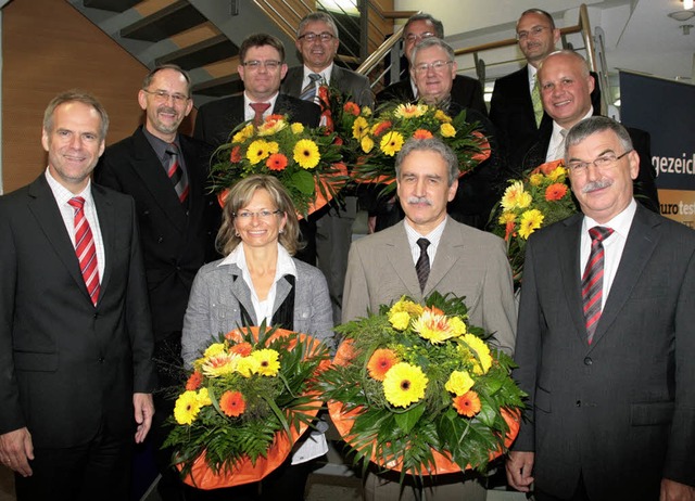 Ehrungen bei der Volksbank (von links ...tt und Vorstandsmitglied Timo Baumer.   | Foto: BZ