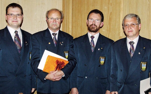 Vorstandssprecher Daniel Schtzle freu...dgar Klausmann (von links n. rechts).   | Foto: Bernd Fackler
