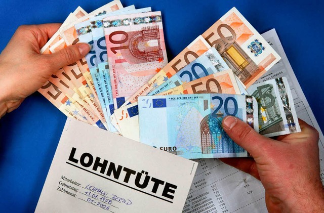 Die Lohntte fllt sich wieder. Der Au...im Schnitt 1100 Euro pro Mitarbeiter.   | Foto: dpa