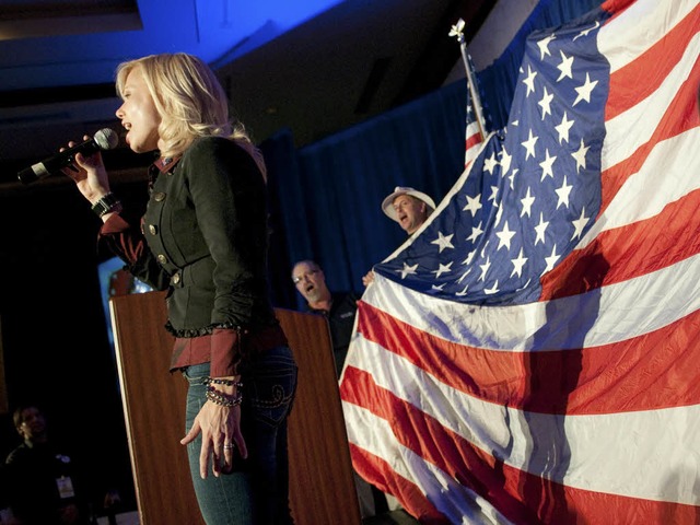 &#8222; God Bless America&#8220; singt...n Washington-Kritiker nach Washington.  | Foto: AFP