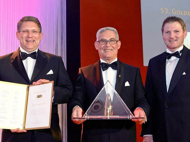 Uwe, Helmut und Gerd Kohler mit dem Goldenen Zuckerhut.  | Foto: Thomas Fedra