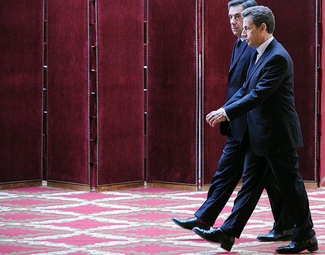 Im Gleichschritt die Probleme Frankrei...ef Sarkozy (vorne) und Premier Fillon   | Foto: afp