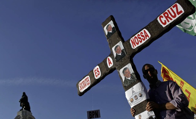 Socrates sei das Kreuz der Portugiesen...tischen Regierungschefs protestiert.    | Foto: AFP
