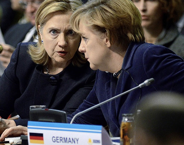 Hillary Clinton und Angela Merkel   | Foto: DPA