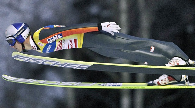 Das Kinn zwischen den Skispitzen &#821...ische Skispringer Thomas Morgenstern    | Foto: afp