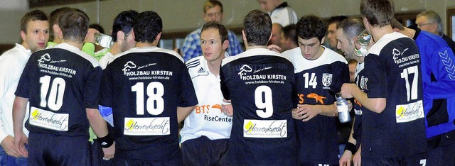 Co-Trainer Thomas Armbruster (Mitte) v...ankten Bernd Junker beim erfolgreich.   | Foto:  Wolfgang Knstle