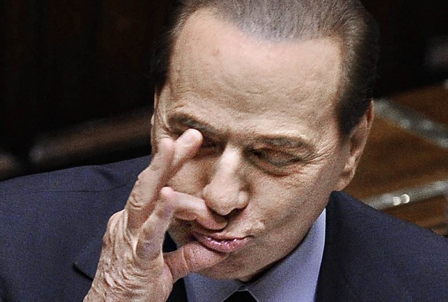Sieger des Tages: Italiens Ministerprsiden Silvio Berlusconi   | Foto: DPA