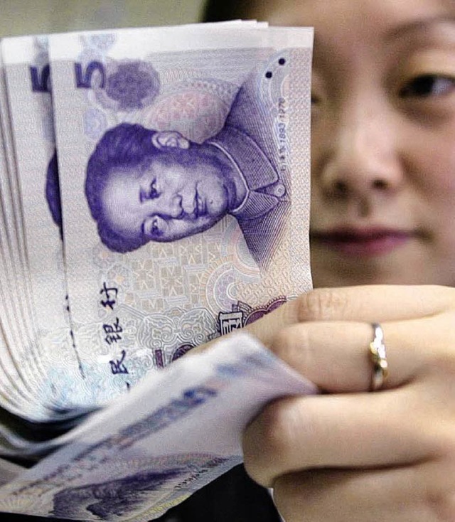Geld ffnet in der Volksrepublik China viele Tren.  | Foto: AFP