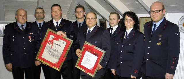 Zahlreiche Ehrungen gab es bei der Riegeler Feuerwehr und ihrem Spielmannszug.   | Foto: Helmut Hassler