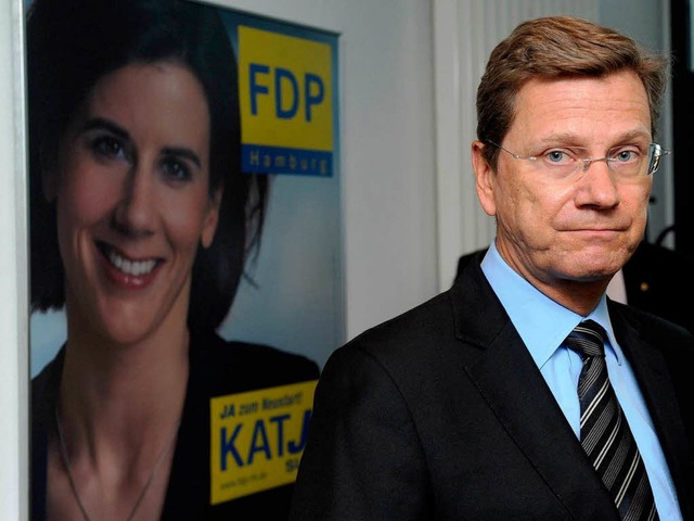 Zwei Gesichter einer Partei: Auf dem W...do Westerwelle wirkt eher skeptisch.    | Foto: dpa