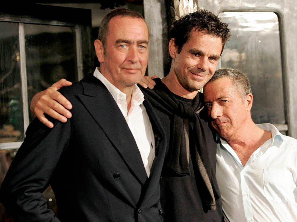 2005: Mit dem Regisseur Tom Tykwer (Mitte) und Weltstar Dustin Hoffman