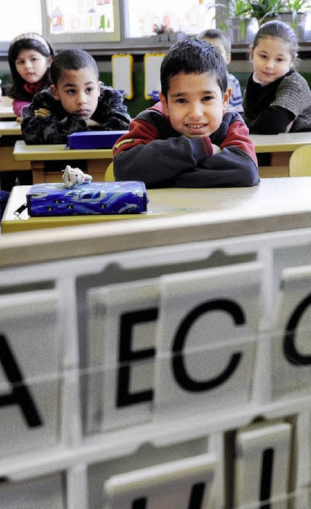 Schler mit und ohne besonderen Frderbedarf  sitzen in einer Klasse.  | Foto: Ingo Schneider