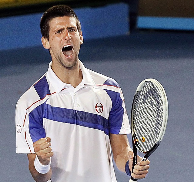 Noch ohne Pokal, dafr berglcklich: Novak Djokovic  | Foto: dpa