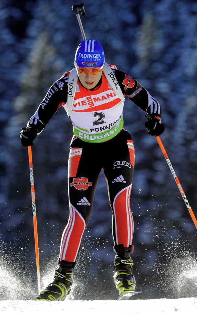 Stcke und Ski: Julia (links) legt los...au wie ihr Vorbild  Magdalena Neuner.   | Foto: afp/felix held