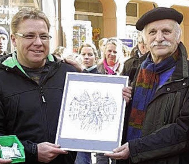 Michael Fesenmeier ergatterte bei der ...eigerung das Bild von Horst Schtzle.   | Foto: Eberhard Weiss