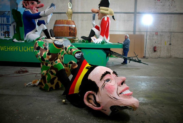 Die Affre um Karl-Theodor zu Guttenbe... vor allem an denen der Karnevalisten.  | Foto: dpa