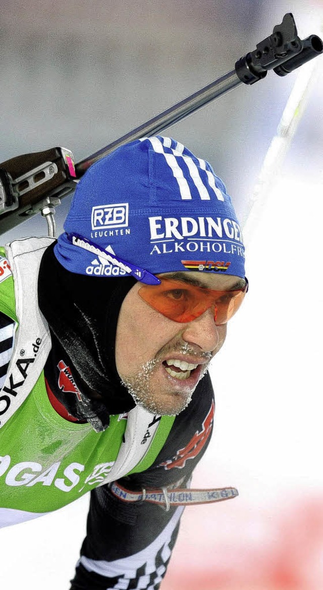 Eis im Bart, aber keine Medaille: Michael Greis im Ziel.    | Foto: dapd