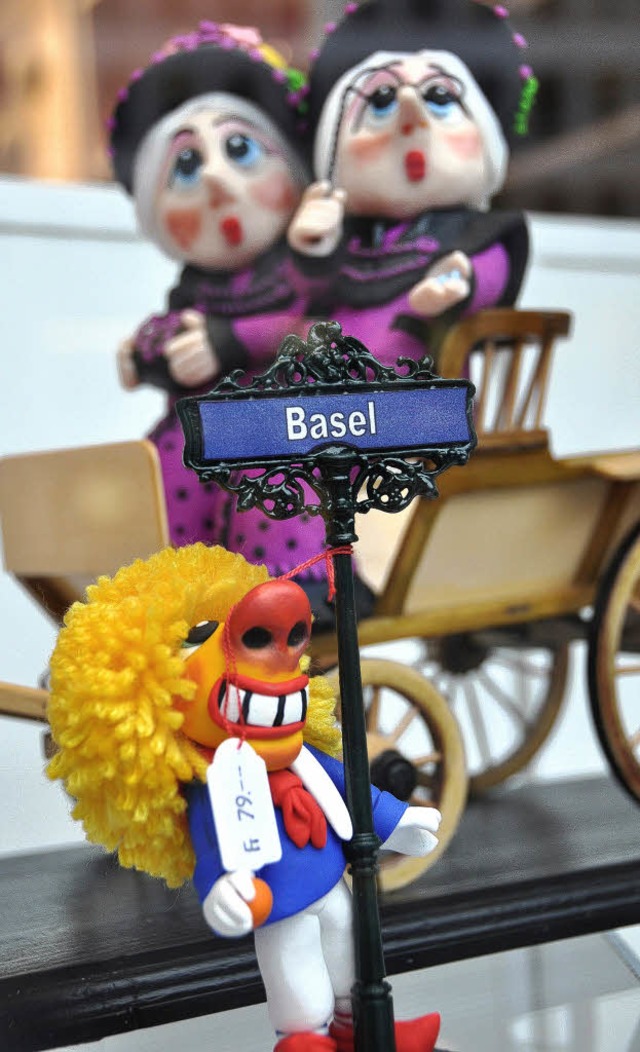 Traditionsfiguren wie Waggis und Alti ...as Straenbild der Basler Innenstadt.   | Foto: Daniel Gramespacher