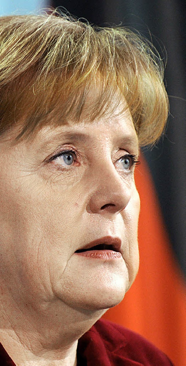 Kanzlerin Angela Merkel kndigt an, da...m es heute erneut zu einer Explosion.   | Foto: dpa/afp