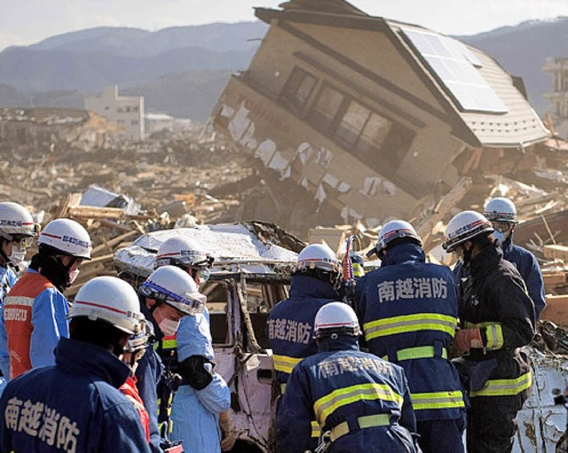 Rettungskrfte in Rikuzentaka, Prfektur Iwate   | Foto: AFP