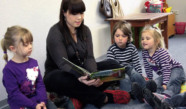 Vorgelesen wird in den Kindergrten, w...rt lngst fest zum Kindergartenalltag.  | Foto: Martina Faller