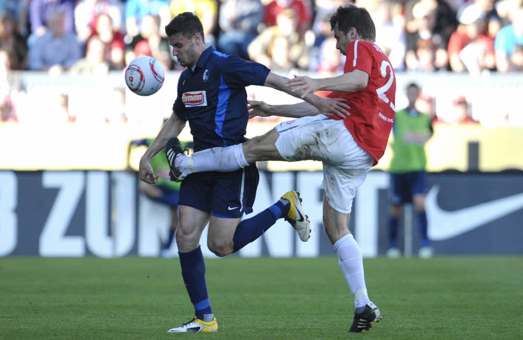 Caligiuri gegn Ivanschitz. Caligiuri gegn Ivanschitz.