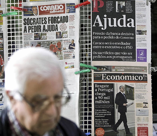 Ajuda bedeutet Hilfe: Schlagzeilen  in Lissabon   | Foto: AFP