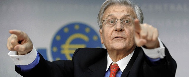 EZB-Chef  Trichet versucht die ffentl...tzen  der Zinserhhung zu berzeugen.   | Foto: DAPD