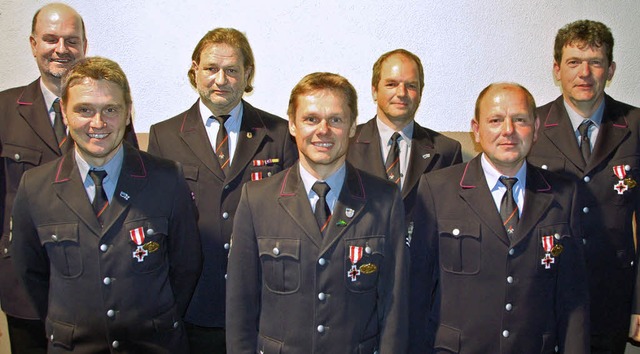 Mitglieder der Feuerwehr Wasenweiler w...nk Ufheil, Axel Briem und Stefan Isele  | Foto: christoph schtzle