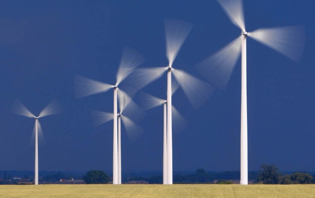 Viel Energie, geringe Umweltschden: Windrder rechnen sich.   | Foto: Patrick Pleul/dpa, photocase.de/kandis