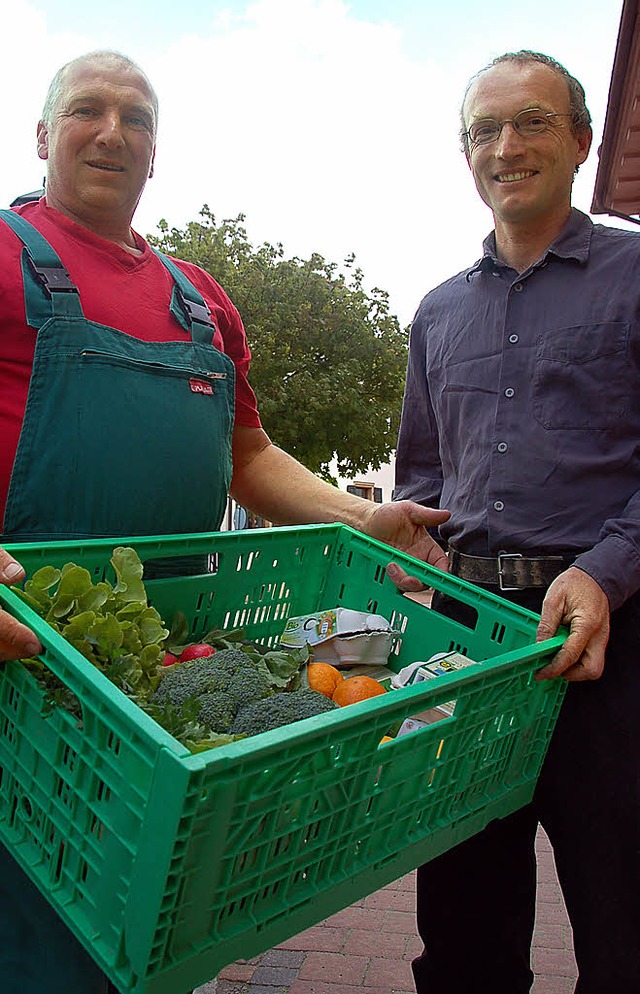Andreas Fendt (links)  und Bernd Maluc...fern Waren auch direkt zu den Kunden.   | Foto: blum