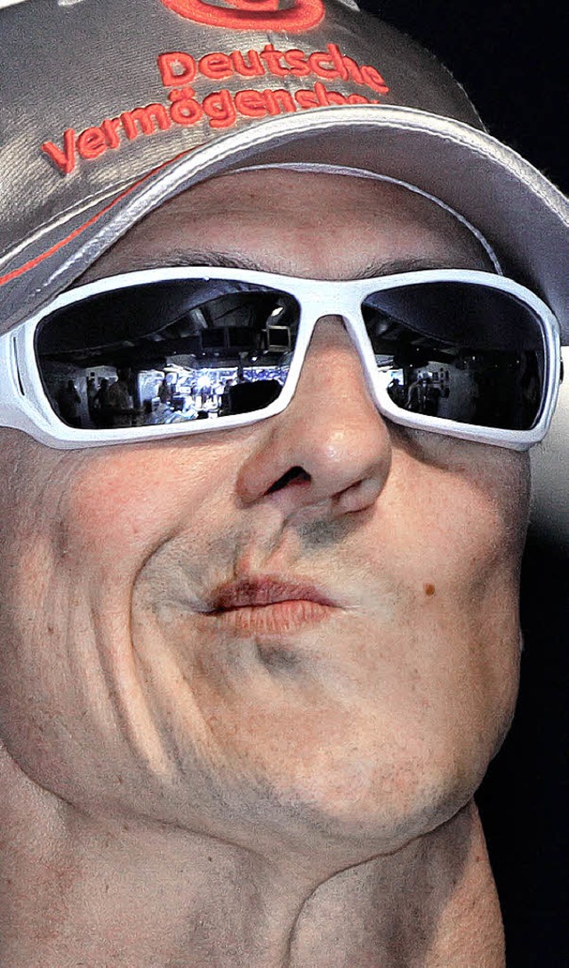 Zufrieden sieht anders aus: Michael Schumacher  | Foto: dpa