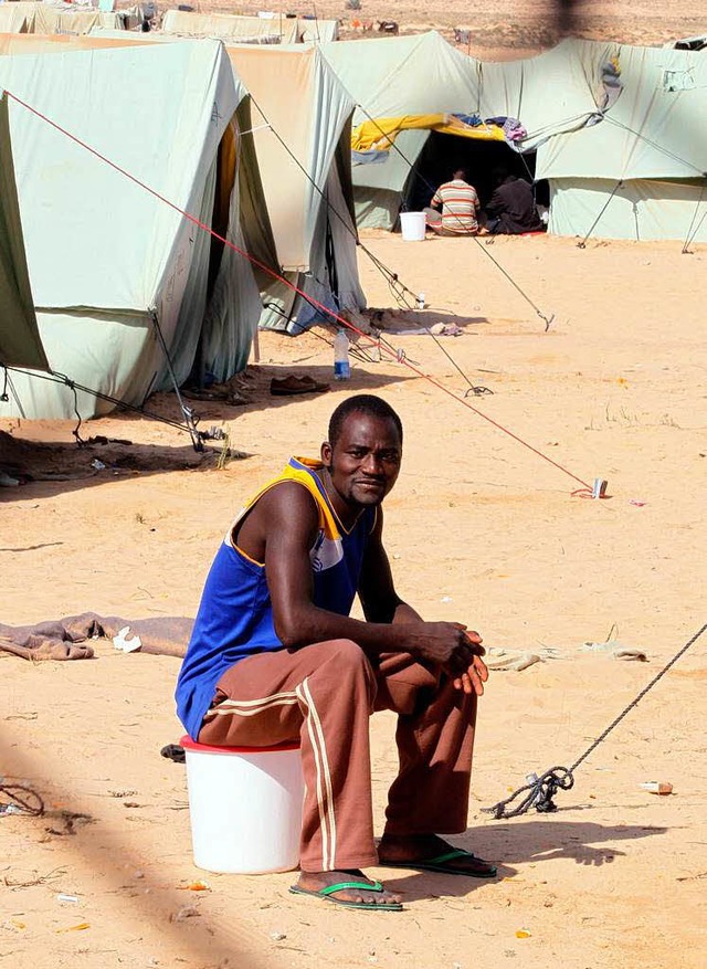 Flchtling in einem Lager bei Ras Jidr   | Foto: DPA