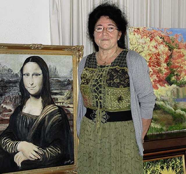 Zwei lchelnde Damen: Mona Lisa und Ev...ntrum St. Maximilian Kolbe ausstellte.  | Foto: Schimanski