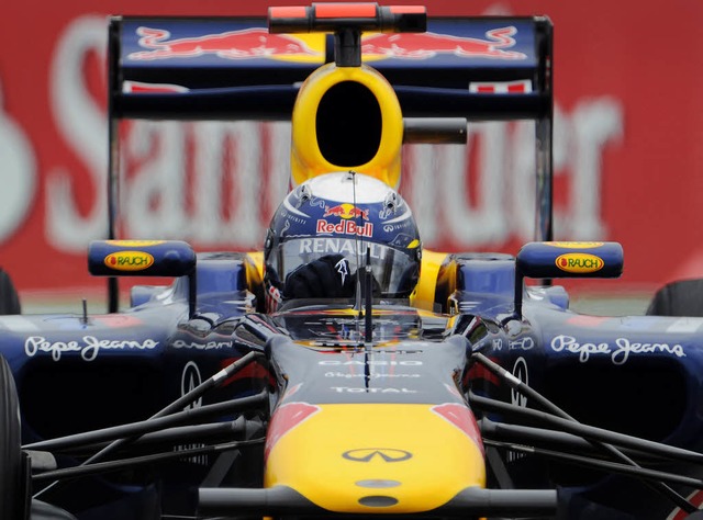 Zum Versuchskaninchen dagradiert: Sebastian Vettel in seinem Red Bull-Boliden   | Foto: afp