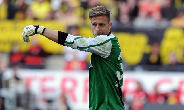 Oliver Baumann hat in der vergangenen ...ur Nummer 1 des SC Freiburg geschafft.  | Foto: AFP