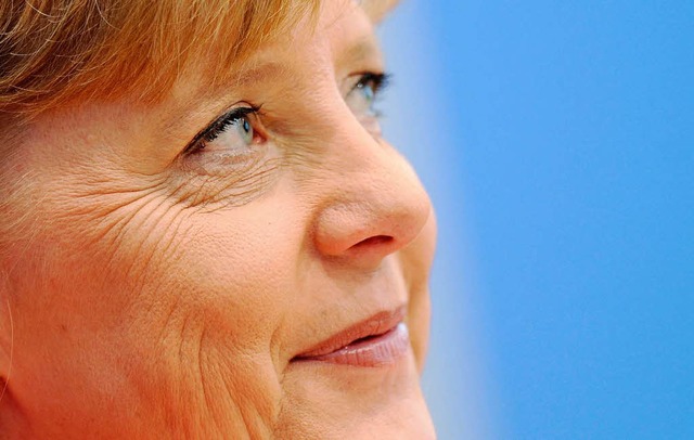 Rechtzufrieden: Angela Merkel  | Foto: dpa/dapd