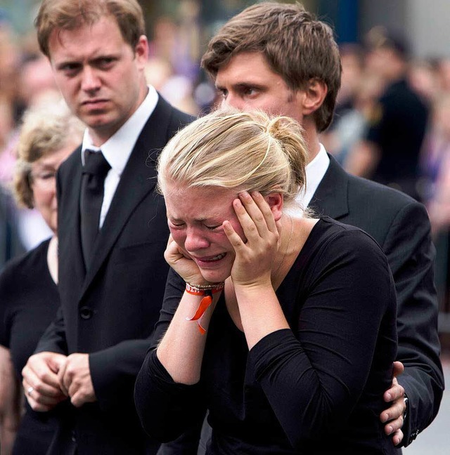 Unfassbare Trauer: Erschtternde Szene...ande des Gedenkgottesdienstes in Oslo.  | Foto: AFP